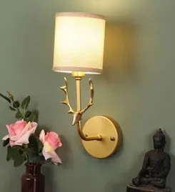 Gold metal wall light